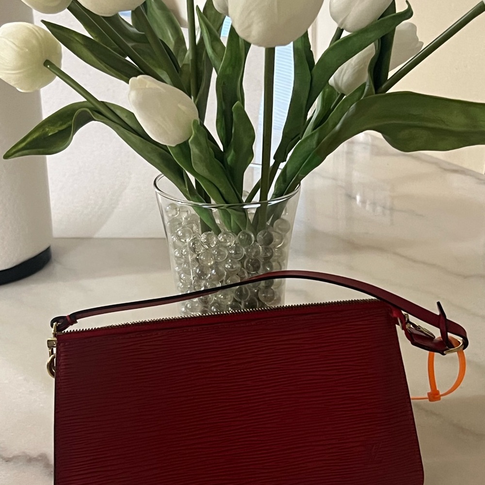 Red Louis Vuitton! Blemish free..No smell COA